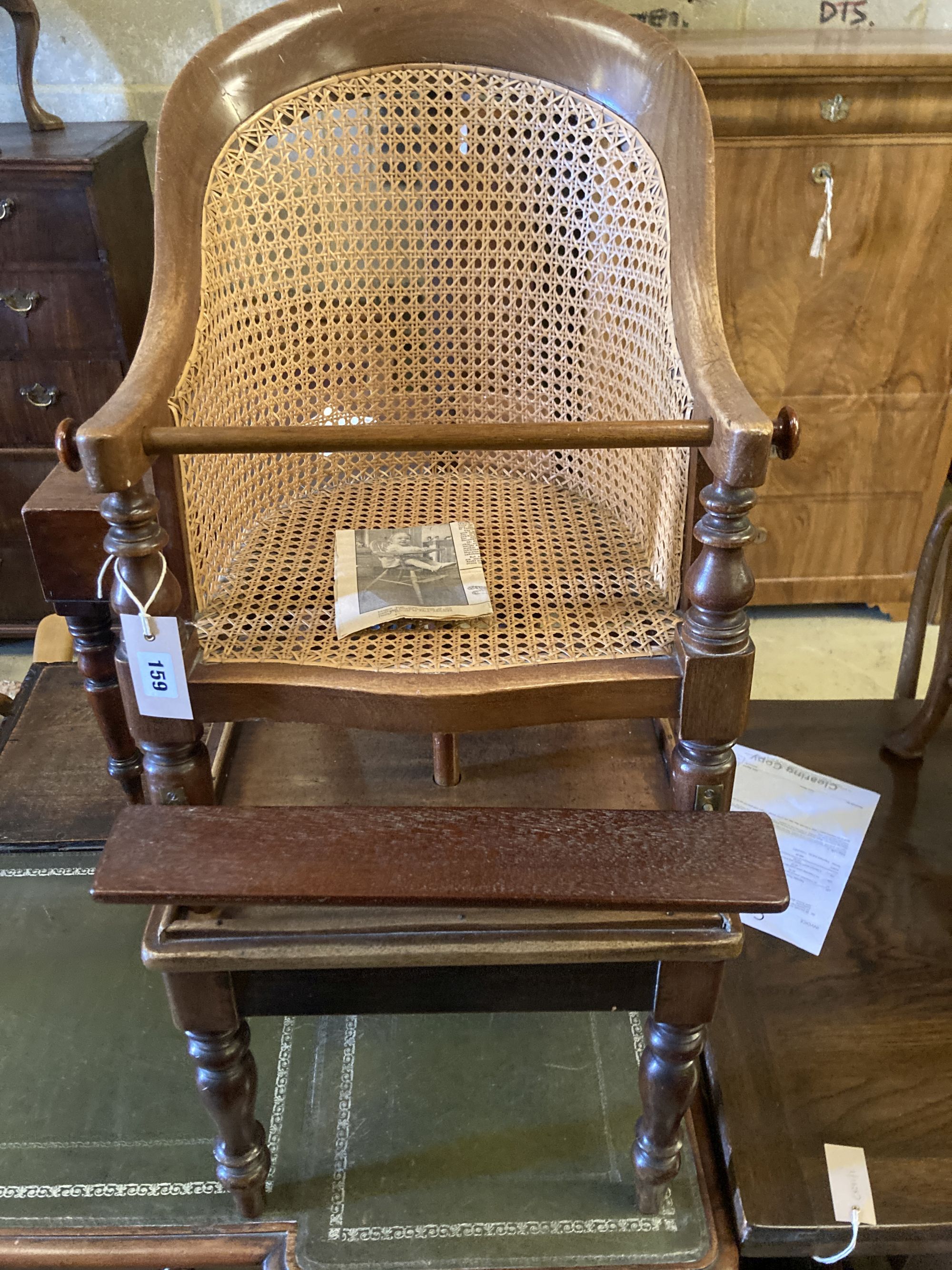 An early Victorian caned mahogany childs high chair on stand, width 42cm, depth 42cm, height 94cm